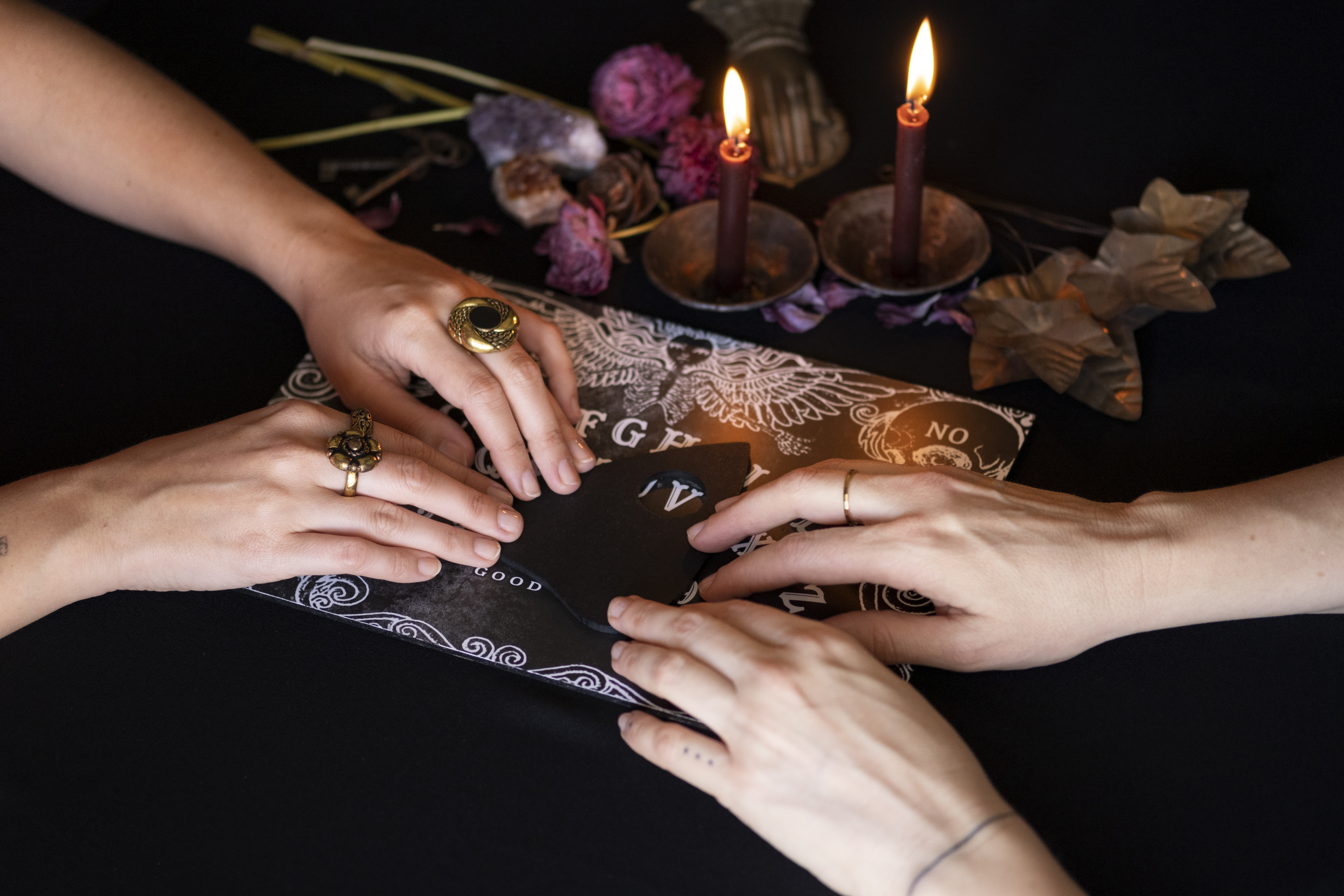 Tarot cards with burning candles