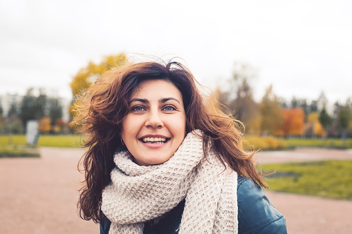 Photo of a happy red-haired woman